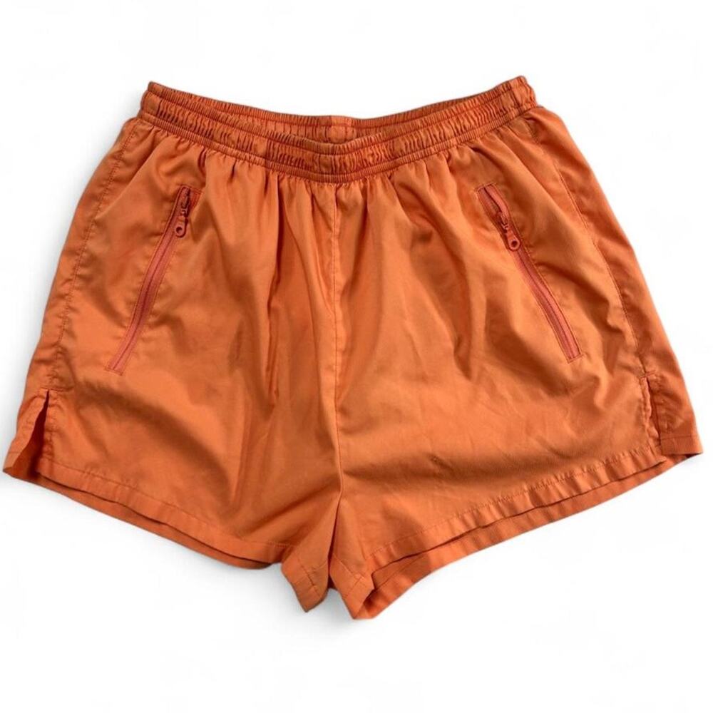 Girlfriend Collective Gazelle orange workout shorts, size Medium